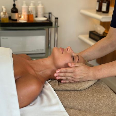 Palanga Life Balance Spa Hotel Exterior photo A woman receiving a facial massage